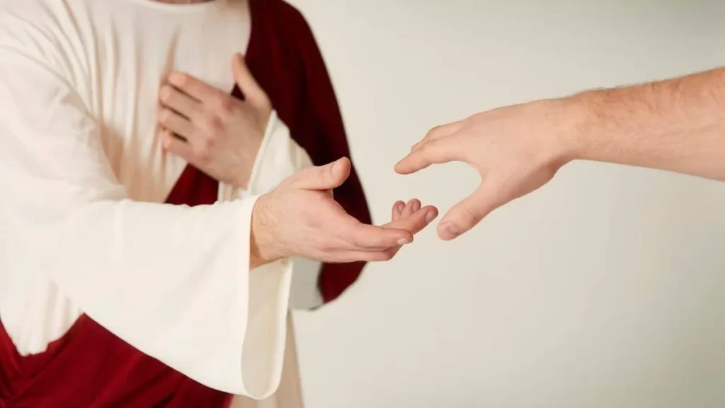 Imagem Jesus buscando alcancar a mao de um fiel do artigo O amor de Deus é muito mais forte que nossas quedas