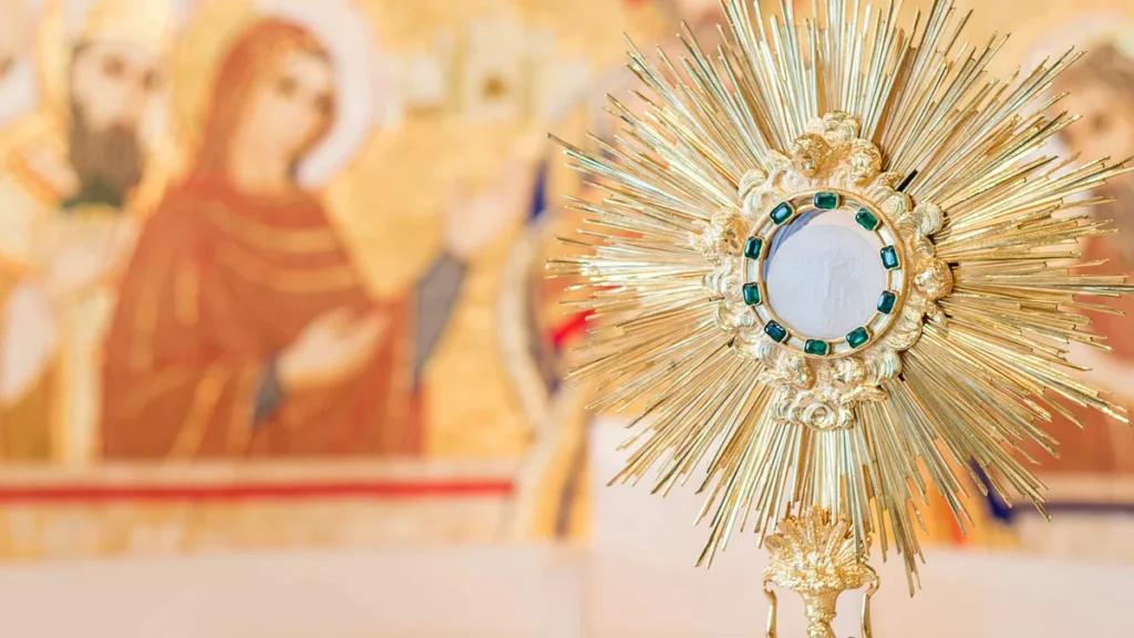 Imagem jesus eucaristico e nossa senhora ao fundo do artigo Um minuto com Maria: Mulher Eucarística