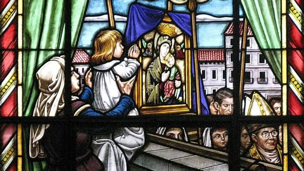 A mulher com o filho doente na janela, durante a procissão do ícone (vitral. Igreja do Perpétuo Socorro, Madri)