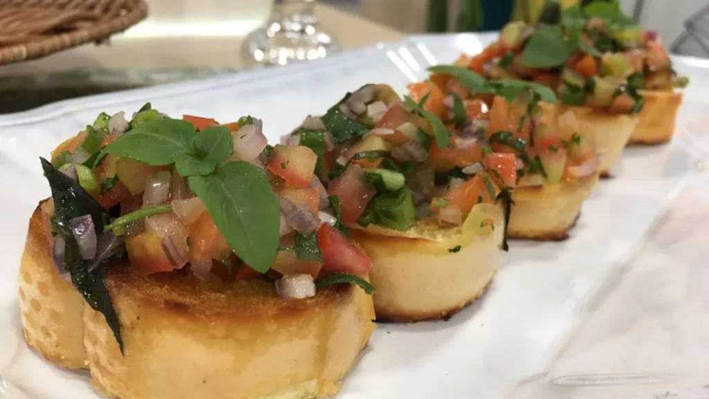 Imagem Bruschetta de tomate fresco do artigo Bruschetta de Tomate Fresco e Macarrão Salteado com Legumes - Santa Receita