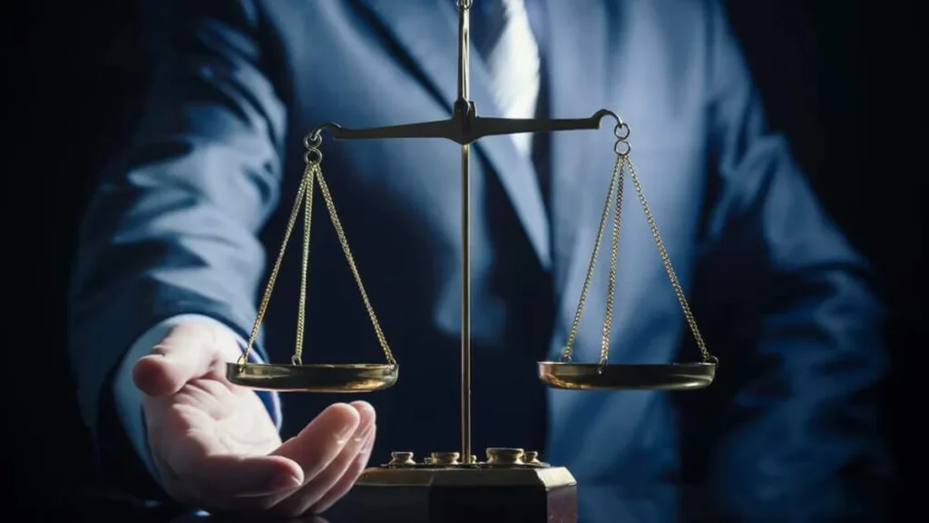 Imagem Advogado e a balanca da Justica do artigo “A advocacia é indispensável à administração da justiça”, revela Daniela Magalhães da OAB-SP