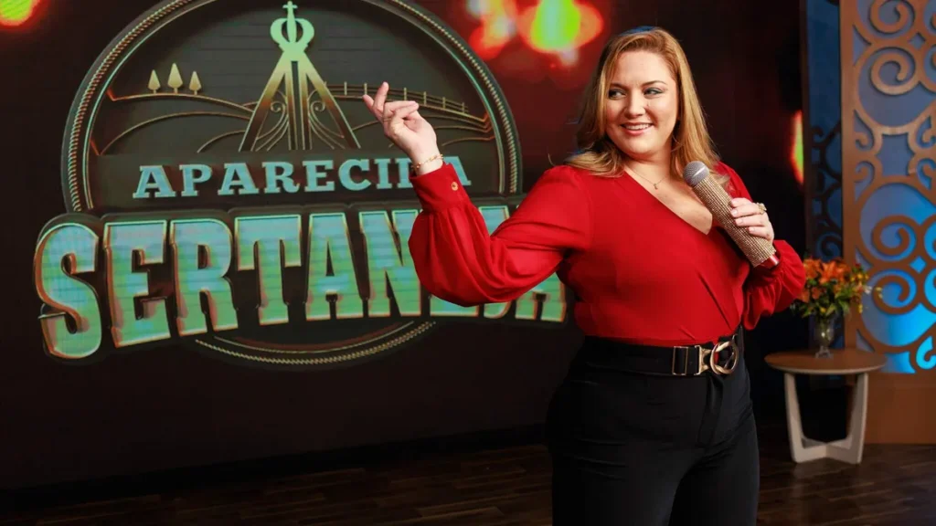Imagem Mariangela Zan Juan Ribeiro TV Aparecida do artigo Frank Aguiar ganha homenagem no "Aparecida Sertaneja"