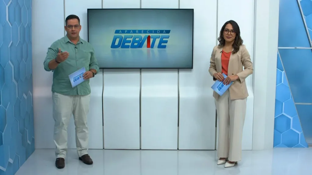 Imagem 1 Eduardo Miranda e Rafaela Lourenco apresentadores do Aparecida Debate do artigo Justiça Social é tema do “Aparecida Debate”