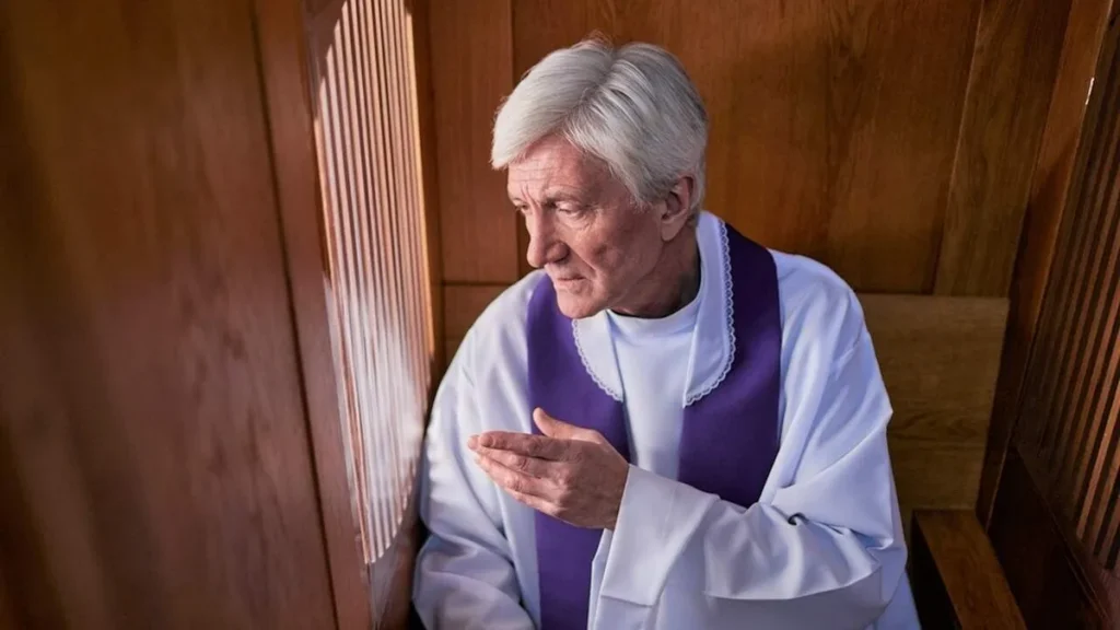 Imagem Padre atendendo no confessionario do artigo Posso confessar apenas no Confessionário?