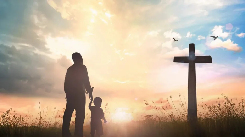 Imagem pai e filho rezando do artigo A fé nos leva a contemplar um horizonte de possibilidades