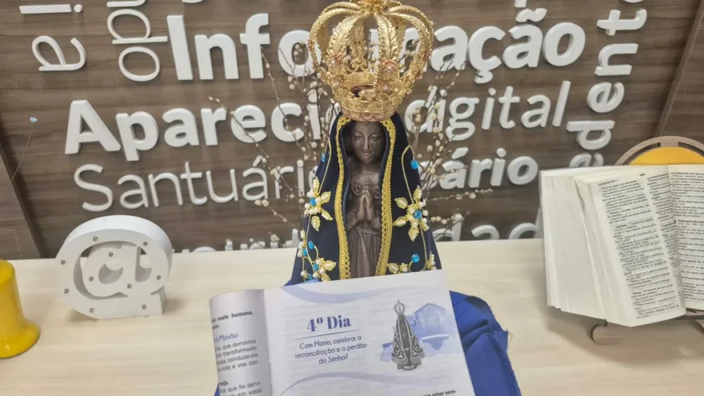 Imagem Livreto da Novena e Festa da Padroeira 2025 do artigo 4º dia da Novena convida devotos a refletir sobre reconciliação