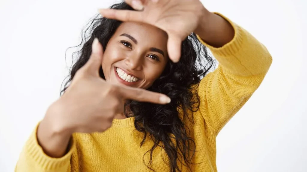 Imagem Mulher sorrindo do artigo Saúde bucal e as nossas emoções: existe relação?